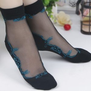 Chaussettes transparentes noires motifs arabesques bleues