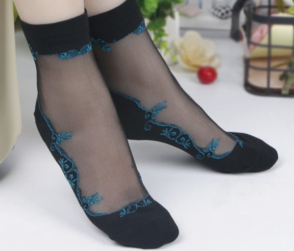 Chaussettes transparentes noires motifs arabesques bleues
